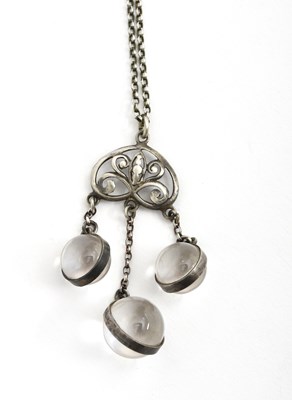 Lot 559 - A silver pendant necklace, pierced and cast...
