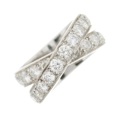 Lot 148 - Cartier, a Nouvelle Vague brilliant-cut diamond crossover ring