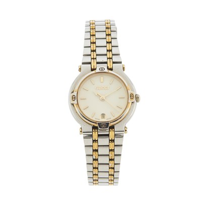 Lot 354 - Gucci, a stainless steel and gold plated 9000L...