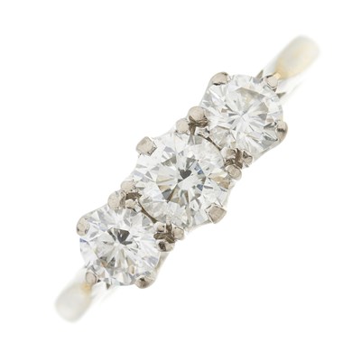 Lot 39 - An 18ct gold brilliant-cut diamond three-stone ring