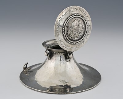 Lot 59 - Alwyn Carr, an Arts and Crafts silver inkwell,...