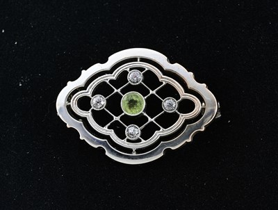 Lot 21 - Murrle Bennett, a peridot and colourless gem brooch