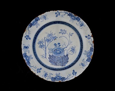 Lot 642 - A Delft blue and white charger, circa 1750,...
