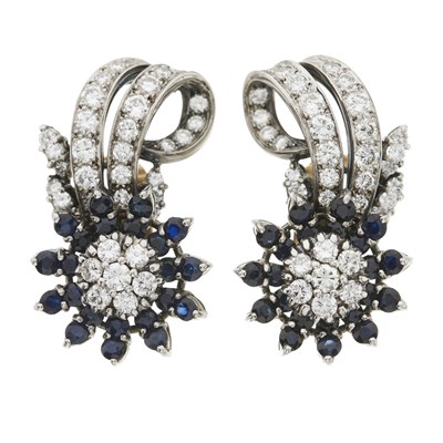 Lot 58 - A pair of brilliant-cut diamond and sapphire floral earrings