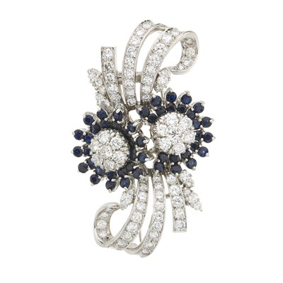 Lot 59 - A brilliant-cut diamond and sapphire floral brooch