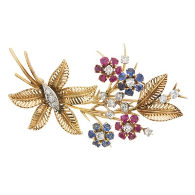 Lot 47 - A brilliant-cut diamond, circular-shape sapphire and ruby floral brooch
