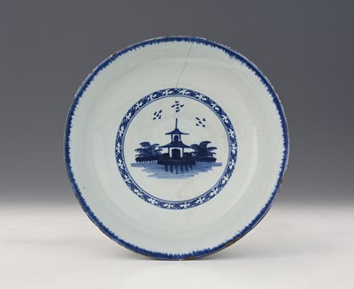 Lot 643 - An English Delft blue and white bowl, circa...