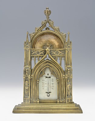 Lot 523 - A Gothic revival cast brass desk thermometer...