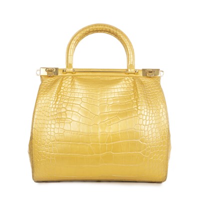 Lot 373 - Kwanpen, a gold alligator handbag, featuring...