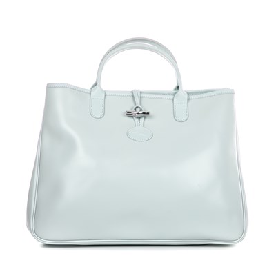 Lot 374 - Longchamp, a pale blue handbag, designed with...
