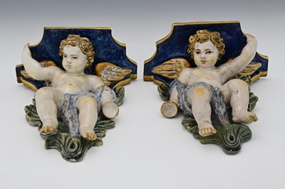 Lot 601 - A pair of Continental faience maiolica figural...