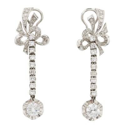 Lot 56 - A pair of diamond drop earrings