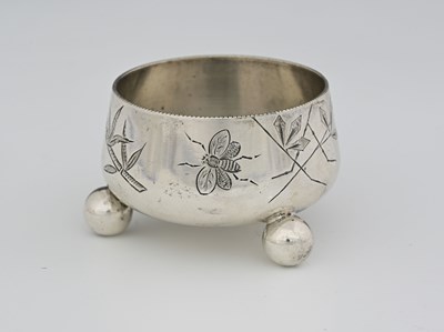 Lot 41 - An Aesthetic Movement engraved silver plated...