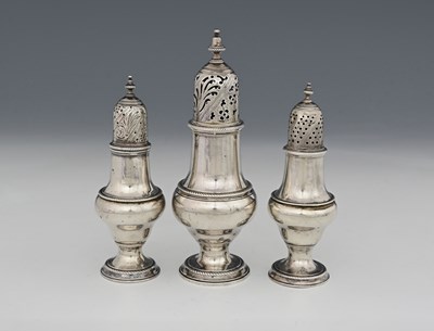 Lot 169 - A set of three George III silver casters, by...