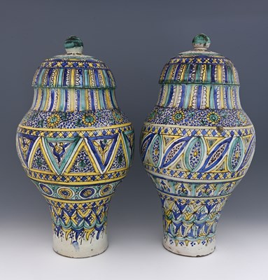 Lot 607 - A large near pair of Moroccan Fassi ware...