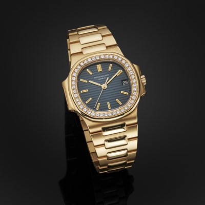Lot 216 - Patek Philippe, an 18ct gold Nautilus bracelet watch