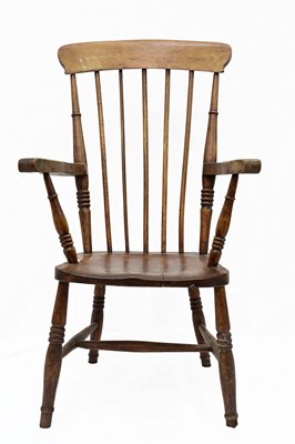 Lot 395 - An elm Thames Valley Windsor arm chair, 19th...