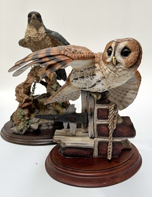 Lot 86 - A Country Artists figure of a peregrine falcon...