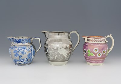 Lot 653 - A silver lustre pealrware pottery jug, circa...