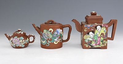 Lot 101 - Three Chinese Yixing (clay) teapots and covers,...