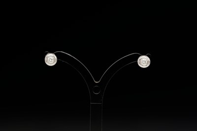 Lot 413 - A pair of 18ct gold brilliant-cut diamond stud earrings