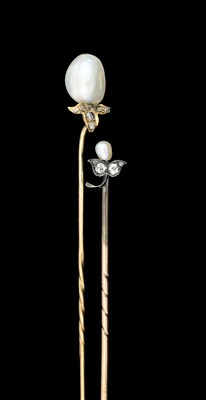 Lot 373 - Two Edwardian pearl and diamond stick pins