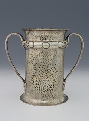 Lot 514 - An Arts and Crafts silver plated bottle...