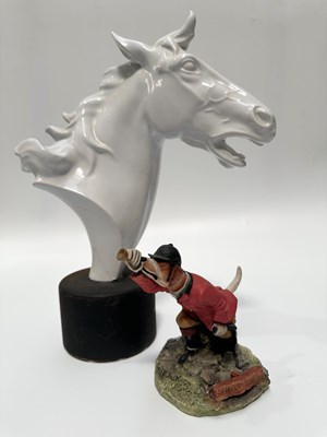 Lot 74 - A white glazed porcelain head or bust of a...