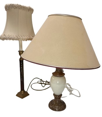 Lot 40 - A brass mounted hardstone table lamp, twisted...