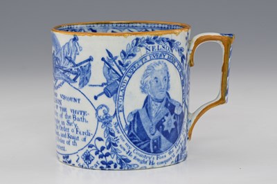 Lot 647 - A blue and white transfer printed mug...