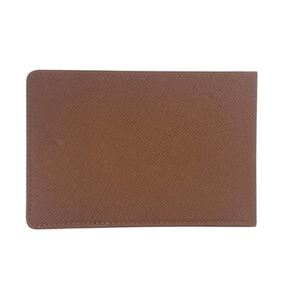 Lot 424 - Louis Vuitton, a Taiga card wallet, crafted...