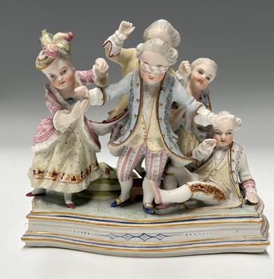 Lot 71 - A Continental tinted bisque figure group after...