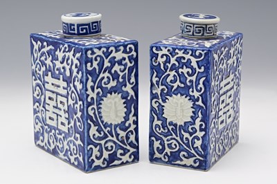 Lot 98 - A pair of Chinese blue and white moulded tea...