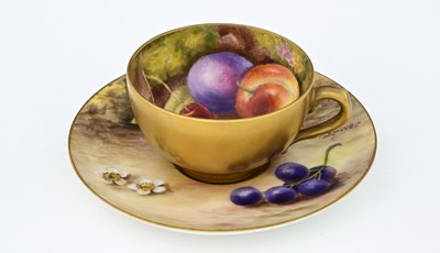 Lot 617 - A Royal Worcester coffee can and saucer by...