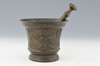 Lot 542 - An Italian bronze mortar and pestle, probably...