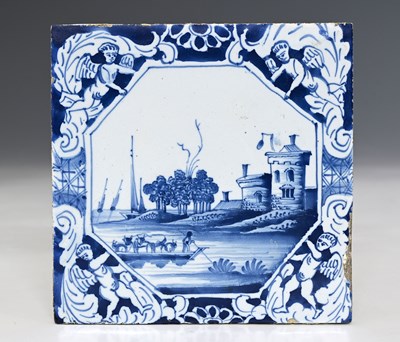 Lot 659 - An English Delft blue and white tile, painted...
