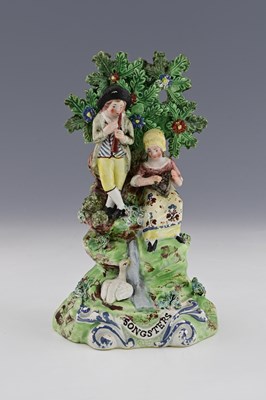 Lot 665 - A Walton Staffordshire boccage figure group,...