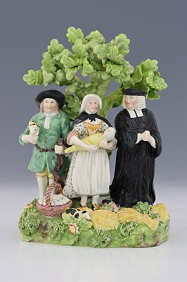 Lot 666 - A Staffordshire Pig Tythe figure group, circa...