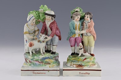 Lot 672 - A pair of Staffordshire pearlware figure...