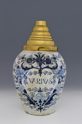 Lot 614a - A Dutch Delft blue and white tobacco jar, De...