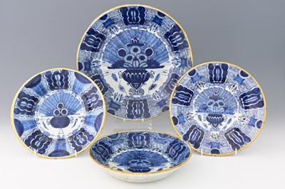 Lot 612a - Four Dutch Delft blue and white Peacock plates,...