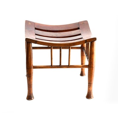 Lot 439 - A Mahogany Thebes stool, probably American,...