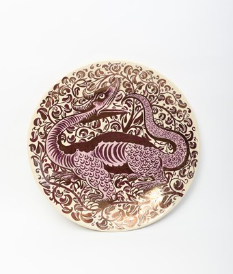 Lot 152 - A William De Morgan Dragon charger by Fred...