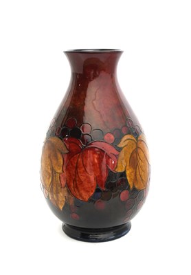 Lot 373 - 'Flambe Leaf and Berry' a large Moorcroft...