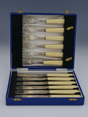 Lot 286 - A cased set of silver and ivorine fish eaters,...