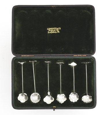 Lot 507 - A set of six Aesthetic Movement Liberty & Co...
