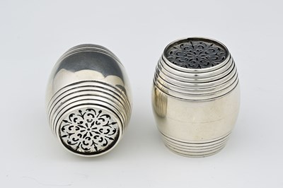 Lot 38 - A pair of Edwardian novelty silver peppers or...