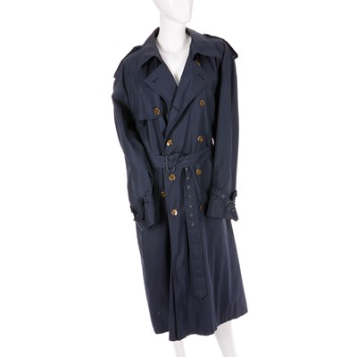 Lot 491 - Yves Saint Laurent, a men's blue trench coat,...