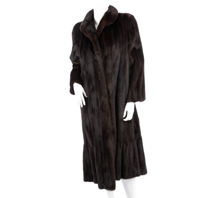 Lot 511 - A full-length dark ranch mink coat, featuring...