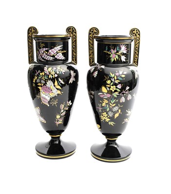 Lot 200 - A pair of tall Jackfield urn vases, enamelled...